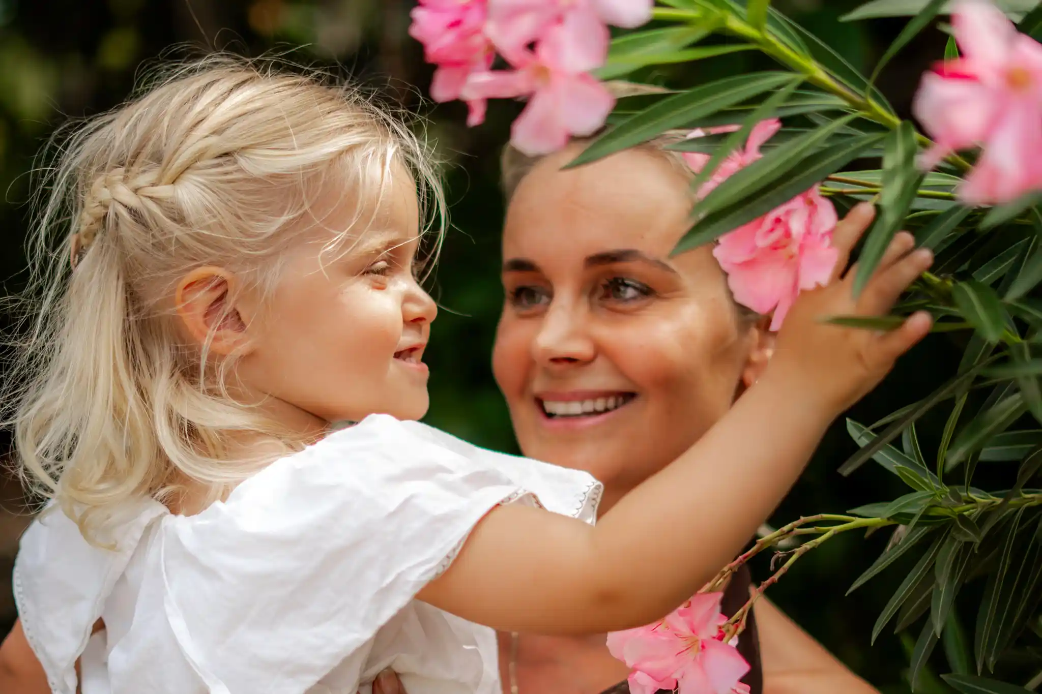 Child and mother with flowers on Bonaire